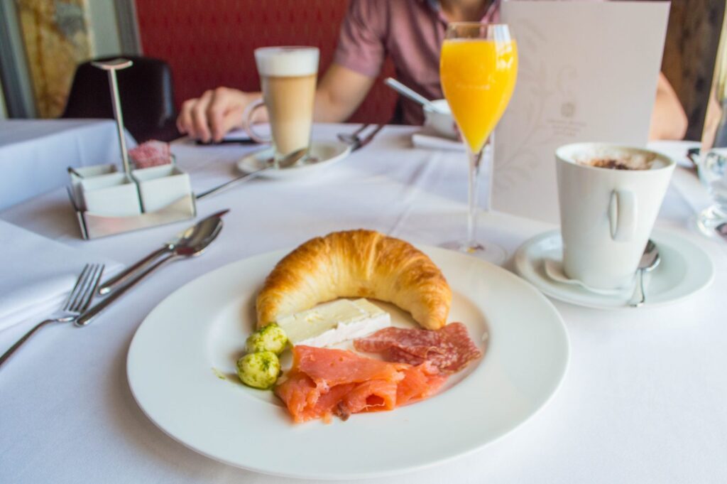 Croissant and smoked salmon breakfast