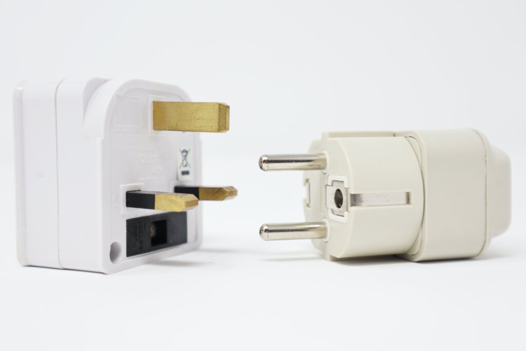 Travel adapters on a white background