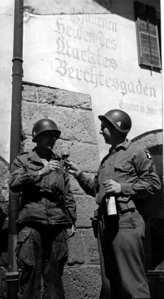 Black and white photo of US soldiers drinking wine in Berchtesgaden