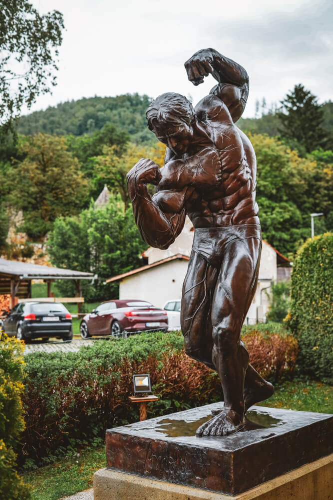 Statue in front of the Arnold Schwarzenegger Museum in Thal, Austria