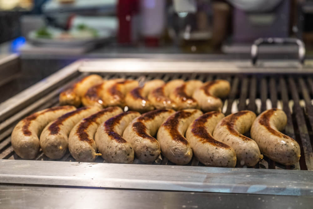 Grilled sausages on display at Oktoberfest in Munich, Germany.