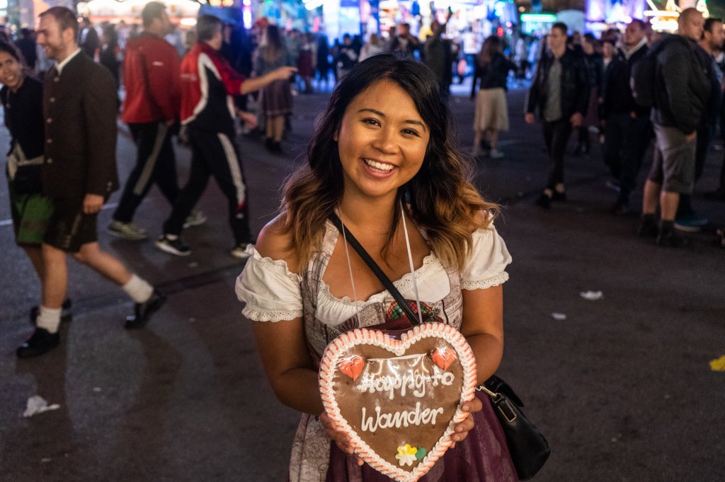 Christina Guan holding a branded cookie at Oktoberfest in Munich, Germany