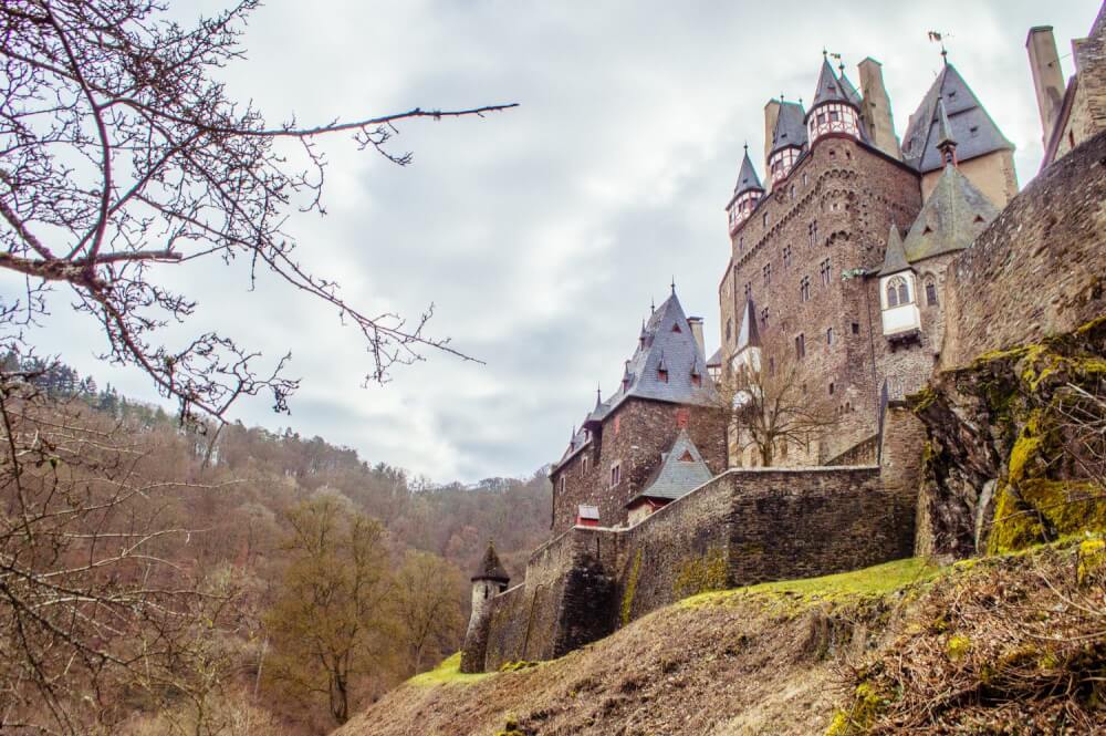 Burg Eltz Castle (Burg Eltz in German, Eltz Castle in English) is by far one of the prettiest fairytale castles in Germany. Click through for a comprehensive guide on visiting Burg Eltz Castle for yourself, including how to get there, what to do there and where to get the best views.