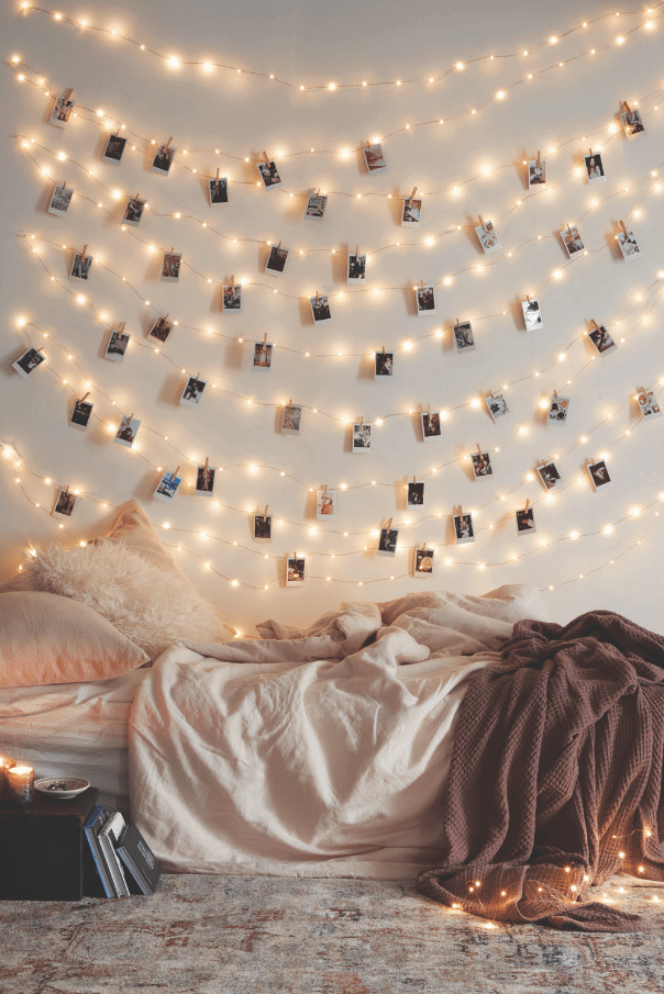 Fairy lights and polaroids display via Urban Outfitters.