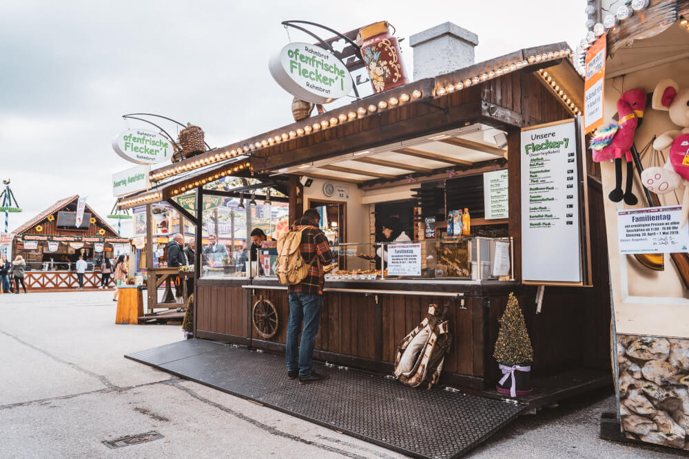 A stall selling Bavarian Rahmfleckerl at a beer festival in Munich.