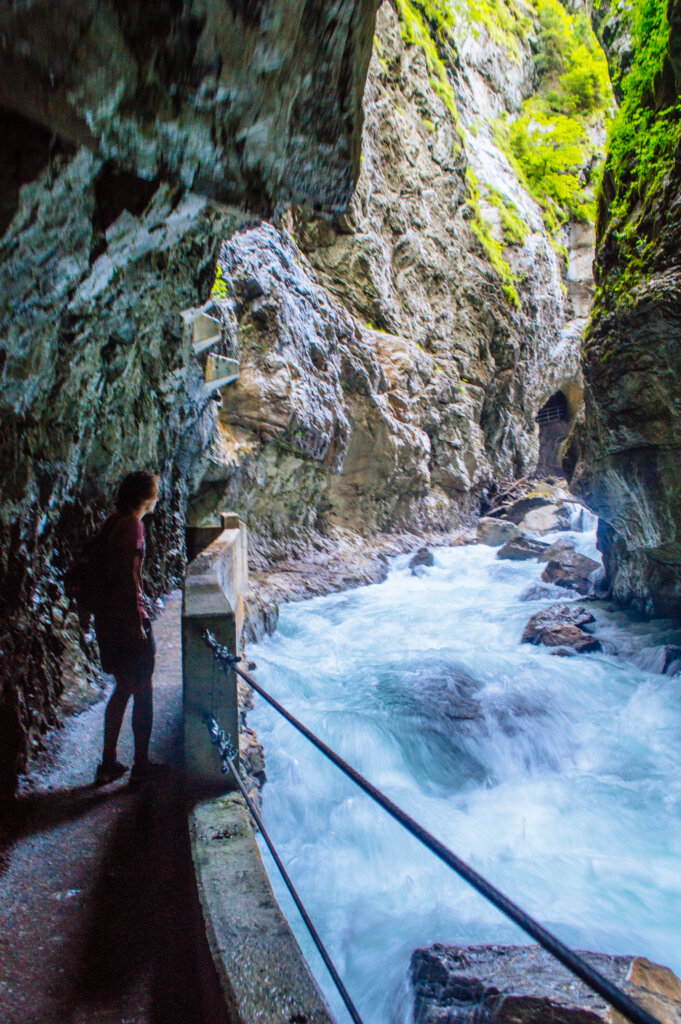 Man walking at the Partnach Gorge in Garmisch-Partenkirchen, Germany