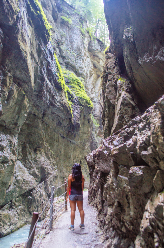 Woman walking at the Partnach Gorge in Garmisch-Partenkirchen, Germany