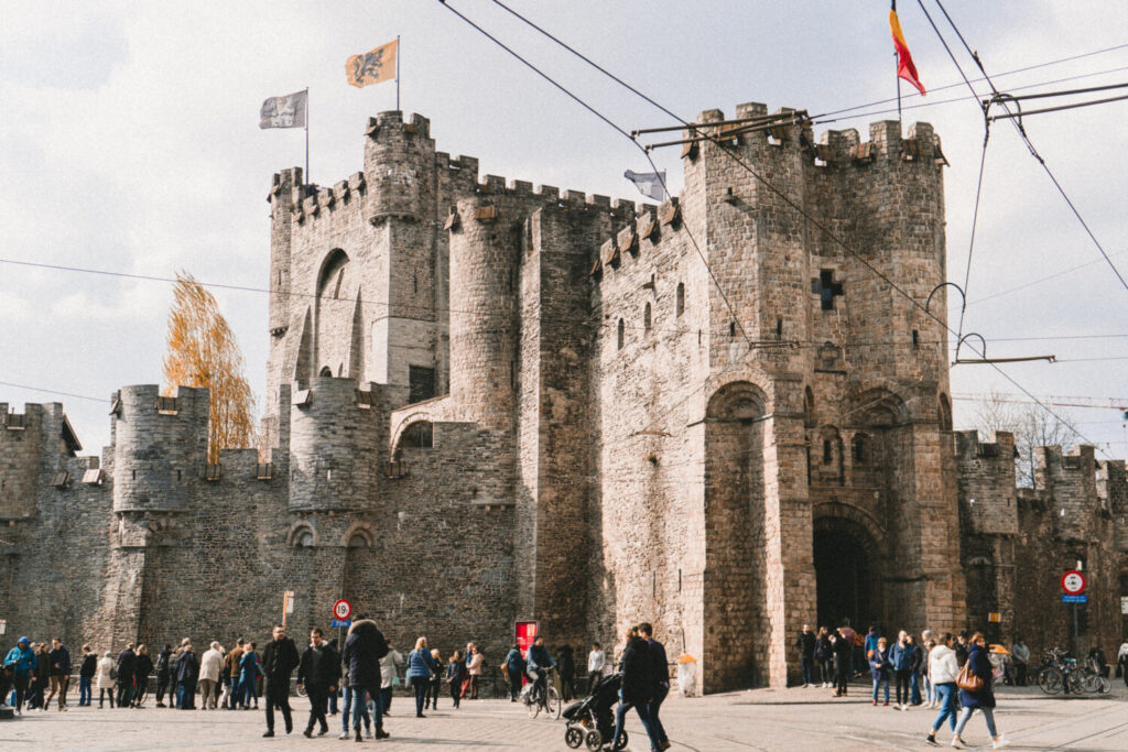 Tourists in front of Gravesteen castle in Ghent