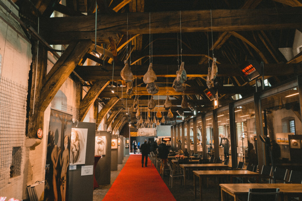 Ghent hams hanging from the ceiling in the Ghent Butcher's Hall