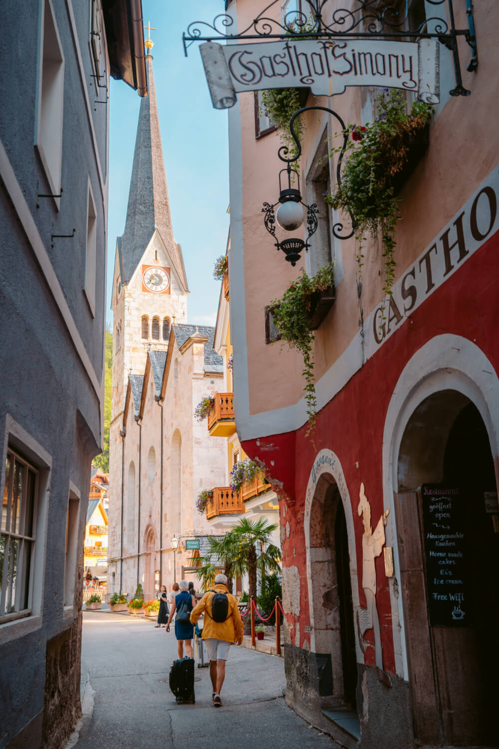 A beautiful walkway in Hallstatt, Austria leading to the Evangelical Church and Marktplatz.