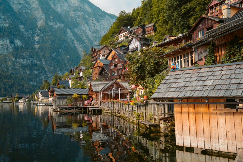 Old wooden houses along the water in Hallstatt, Austria.