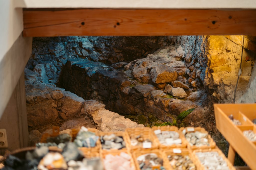 Hidden Roman ruins in a sporting goods shop in Hallstatt, Austria.