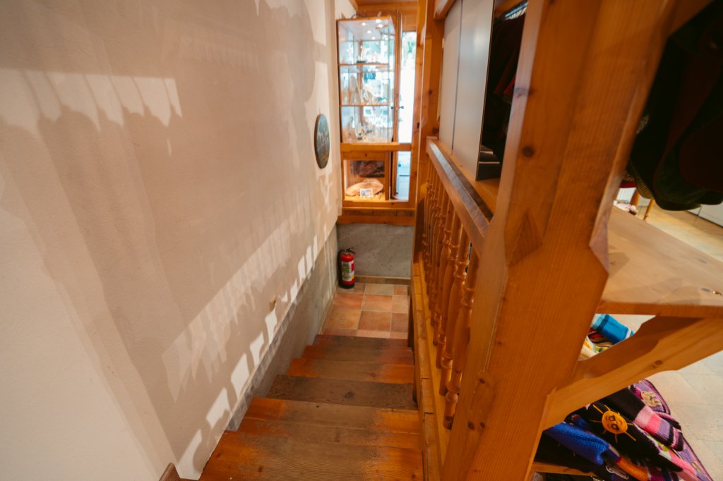 A stairway leading to hidden Roman ruins in a sporting goods shop in Hallstatt, Austria.