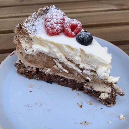 Black forest cake topped with berries