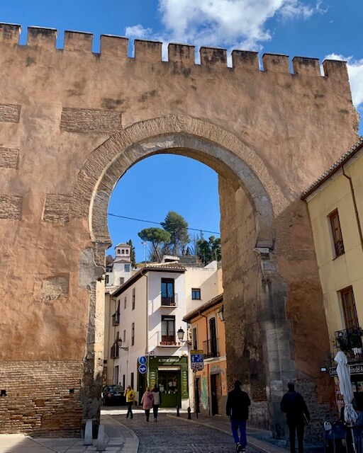 A 30 ft tall arched entryway into the old part of the city