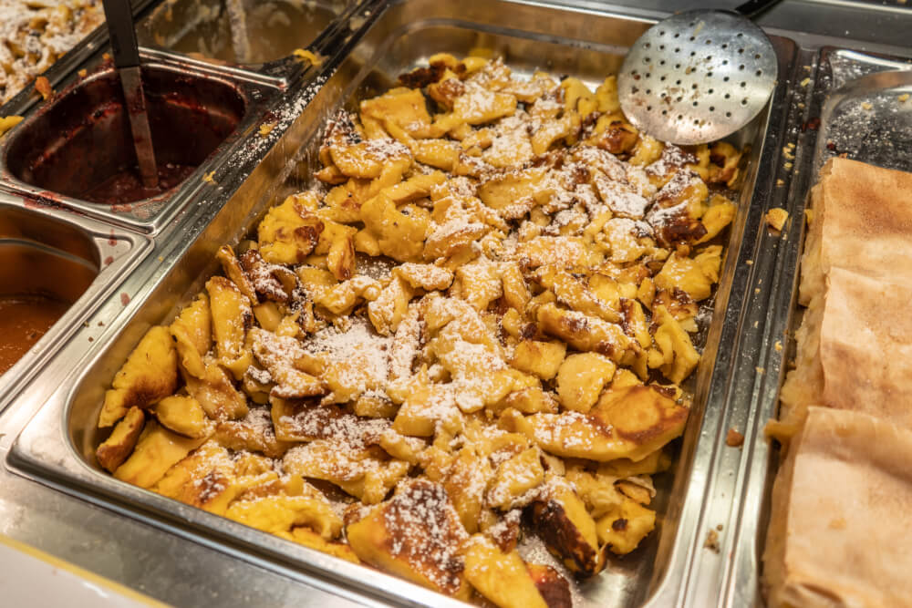 Kasierschmarrn, shredded pancakes served in a dish at Oktoberfest in Munich, Germany.