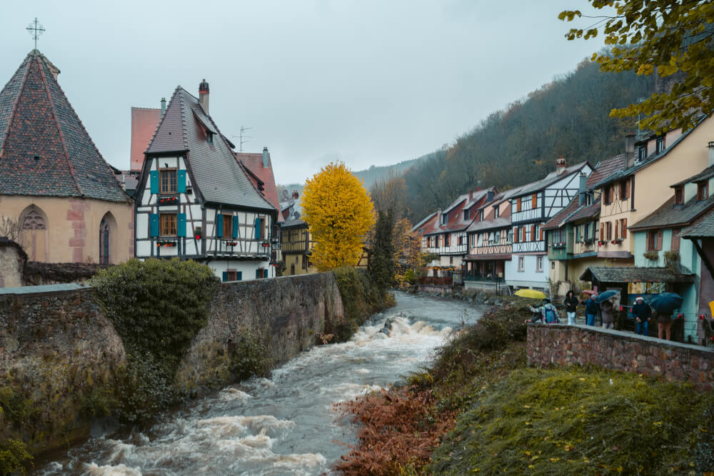 Half timbered houses along the river in Kaysersberg, France