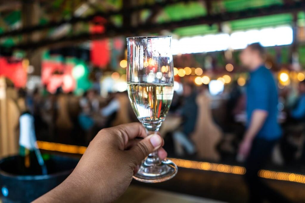 A glass of sparkling wine at the Wine Tent at Munich Oktoberfest in Germany.