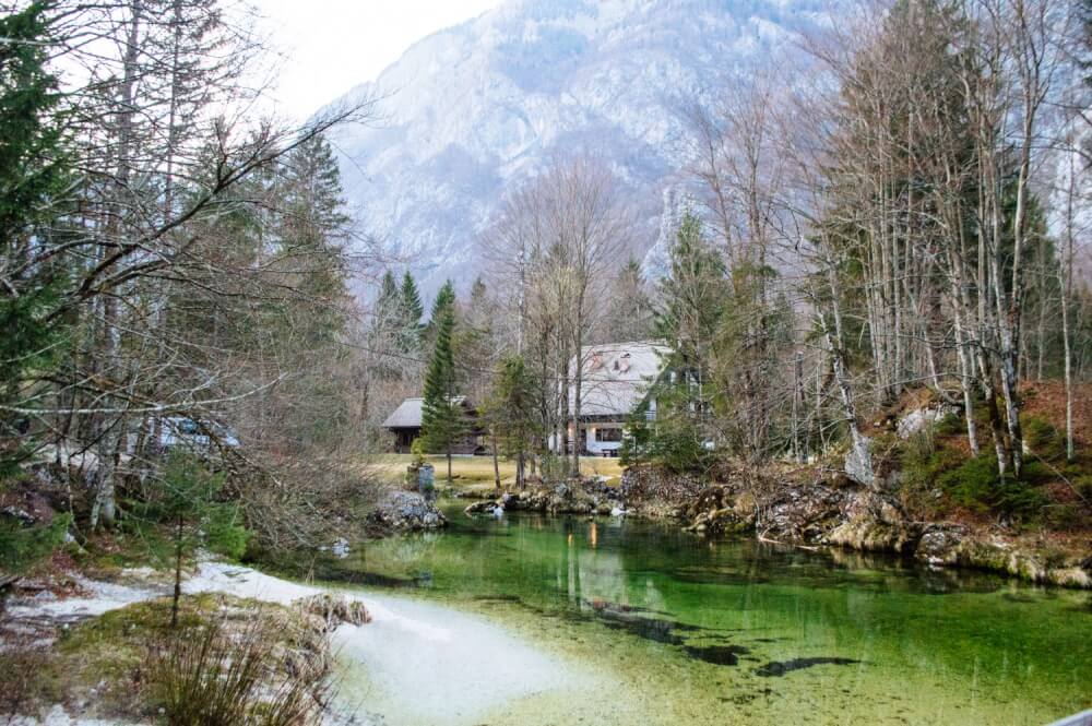 Lake Bohinj, Slovenia is one of THE most magical and serene lakes in the whole world. Here's an easy guide on how to get the best views of this massive lake (Slovenia's largest), including a map on how to get to the best spot for photos.