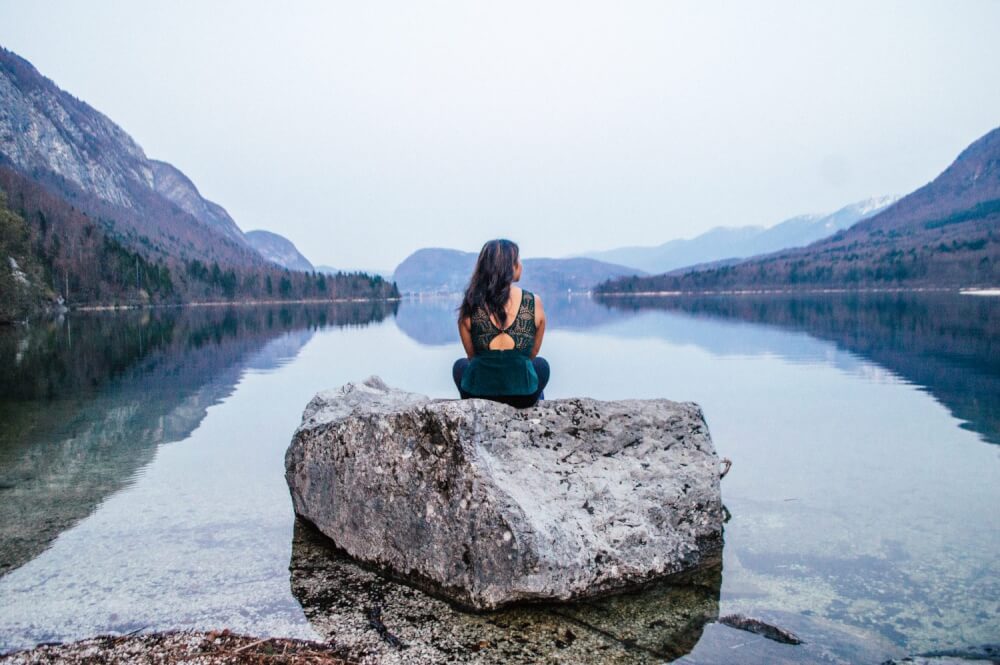 Lake Bohinj, Slovenia is one of THE most magical and serene lakes in the whole world. Here's an easy guide on how to get the best views of this massive lake (Slovenia's largest), including a map on how to get to the best spot for photos.