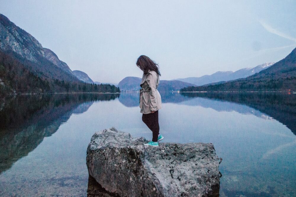 Lake Bohinj, Slovenia is one of THE most magical and serene lakes in the whole world. Here's an easy guide on how to get the best views of this massive lake (Slovenia's largest), including a map on how to get to the best spot for photos.