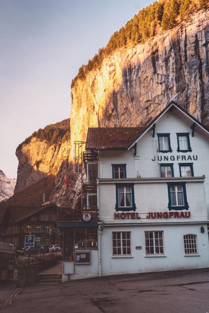 Sunrise view of a hotel in Lauterbrunnen, Switzerland.