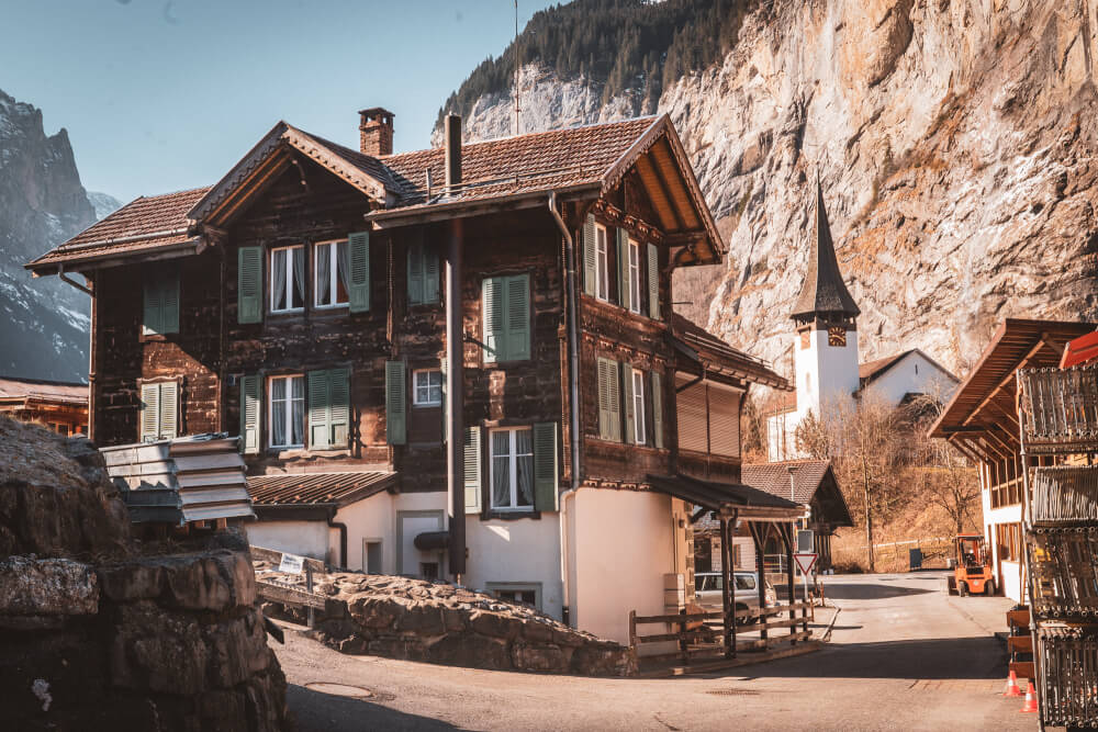 Scenic Lauterbrunnen view from street level with the town church visible.