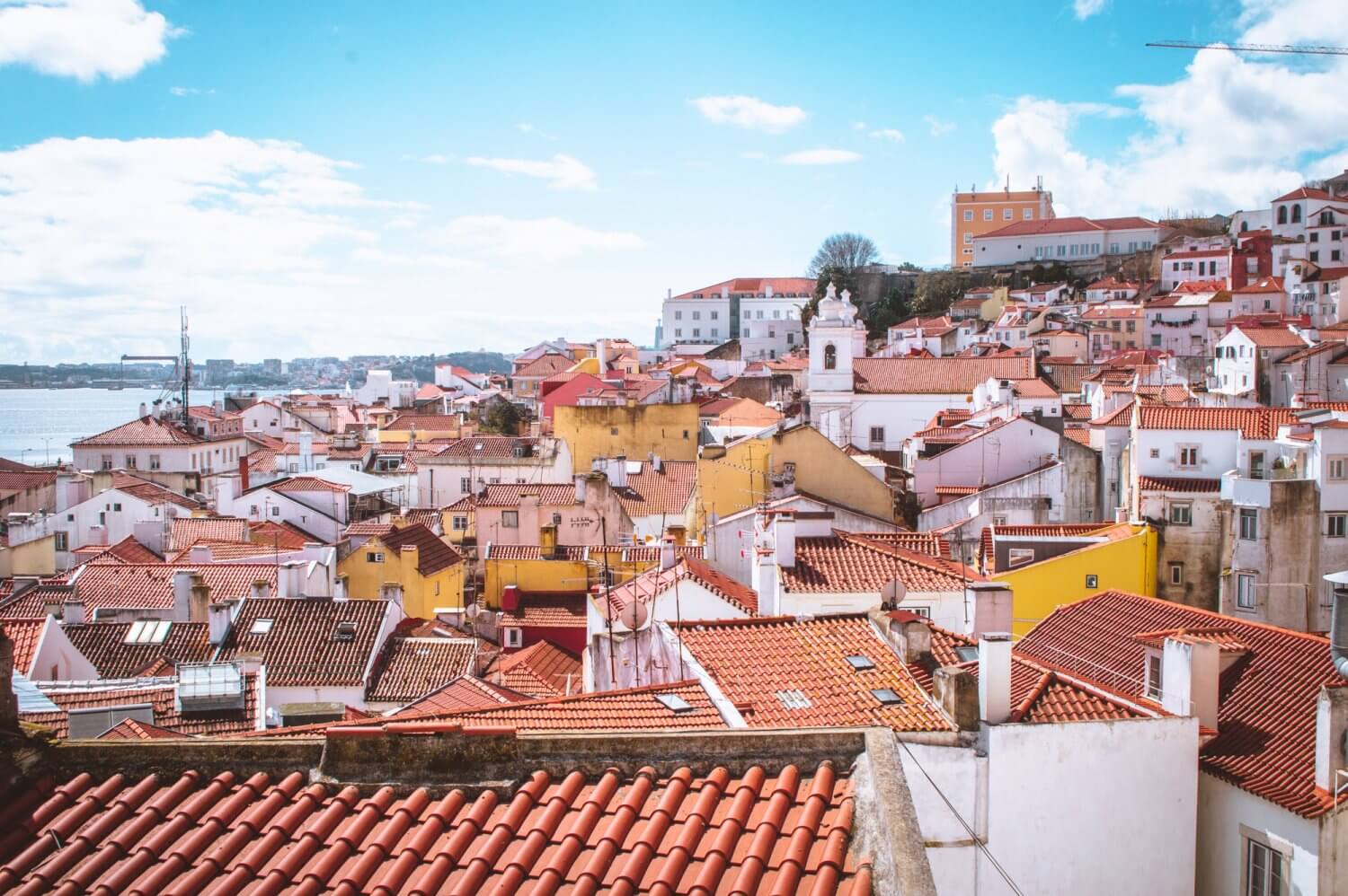 A beautiful sunny day view over Lisbon from Miradouro Santo Estêvão Belvedere 