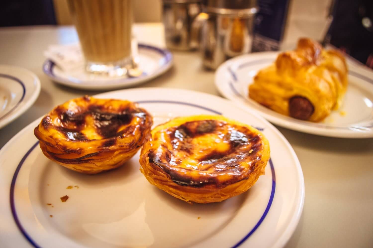 A delicious photo of pasteis de Belem from Confiteria de Belem