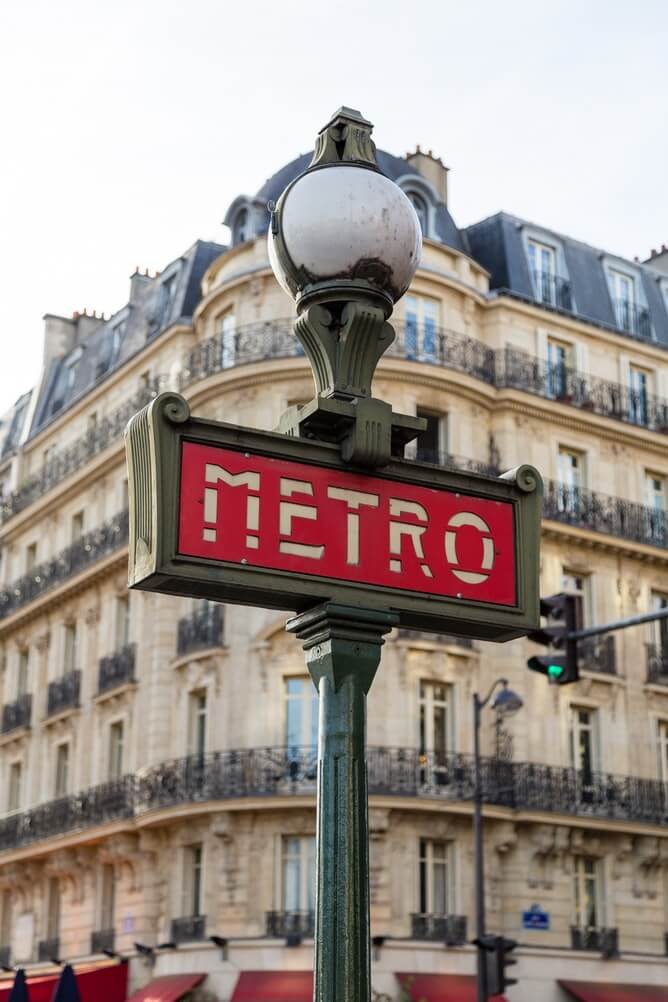 Red Metro sign in Paris, France