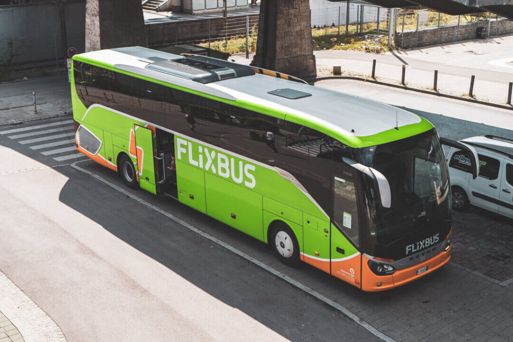 Green and orange Flixbus at Munich ZOB bus station
