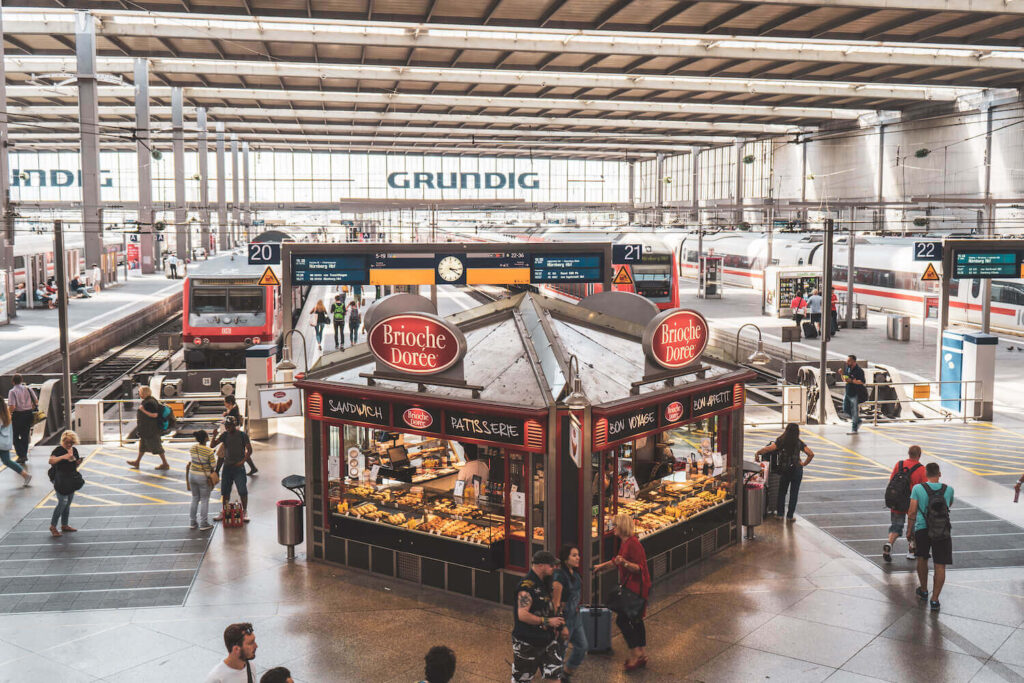 Munich train station with crowds waiting to board their trains