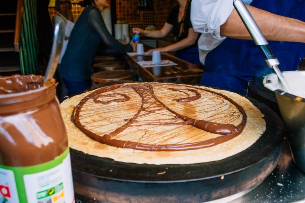 Nutella crepe with an Eiffel Tower drawn on