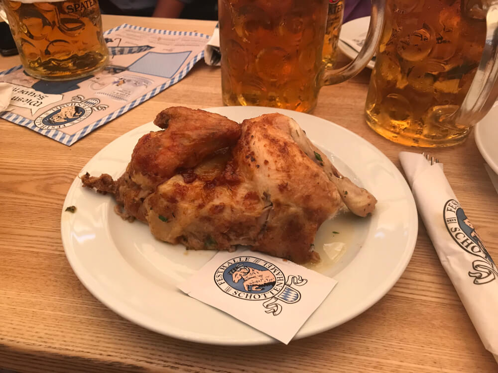 Roast half chicken at Oktoberfest in Munich, Germany.