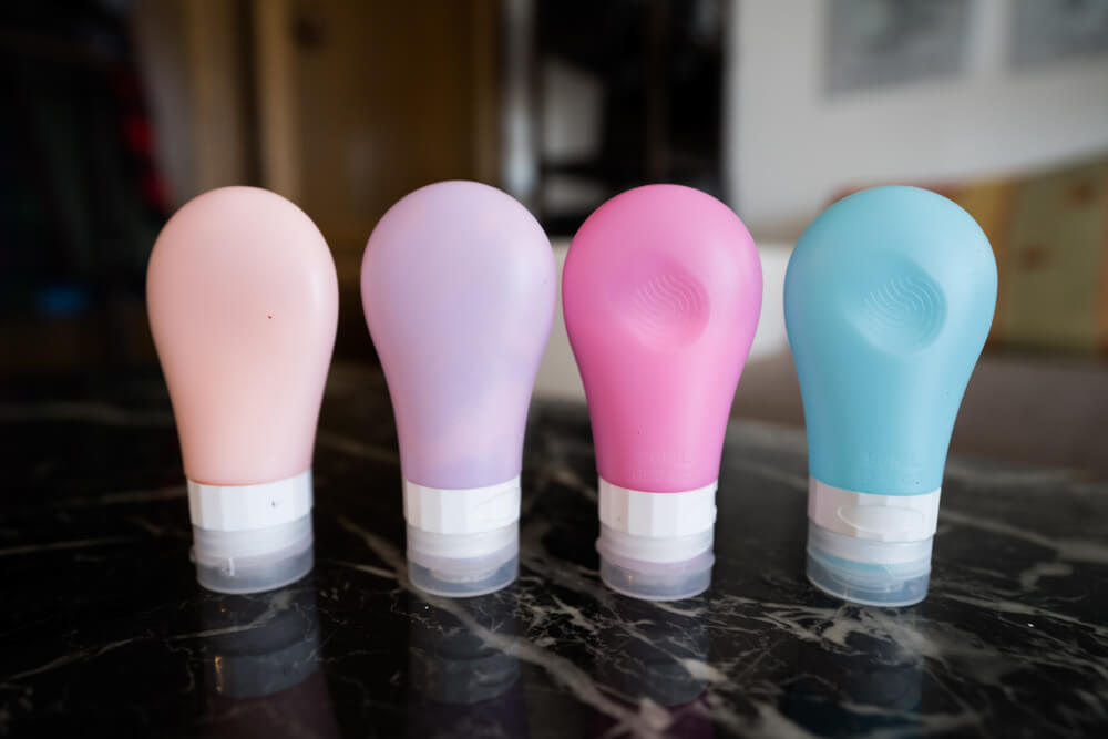 Reusable toiletry liquid bottles in pastel colours