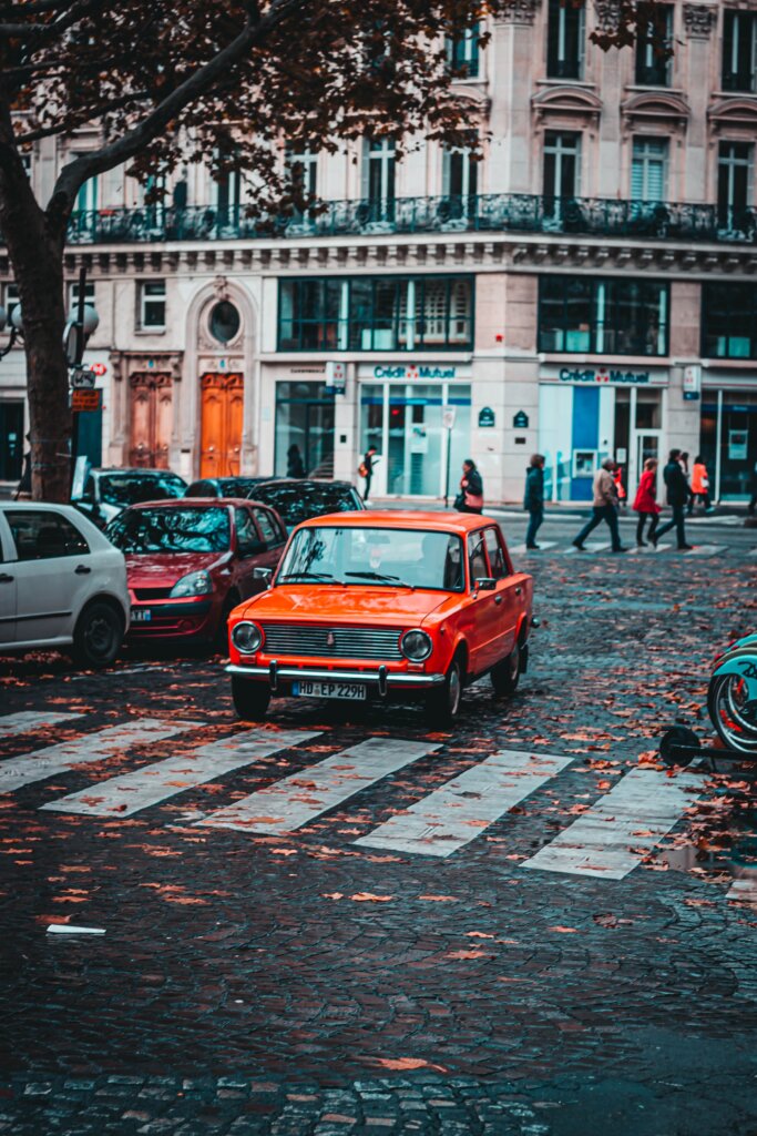 Orange car on a road in Paris