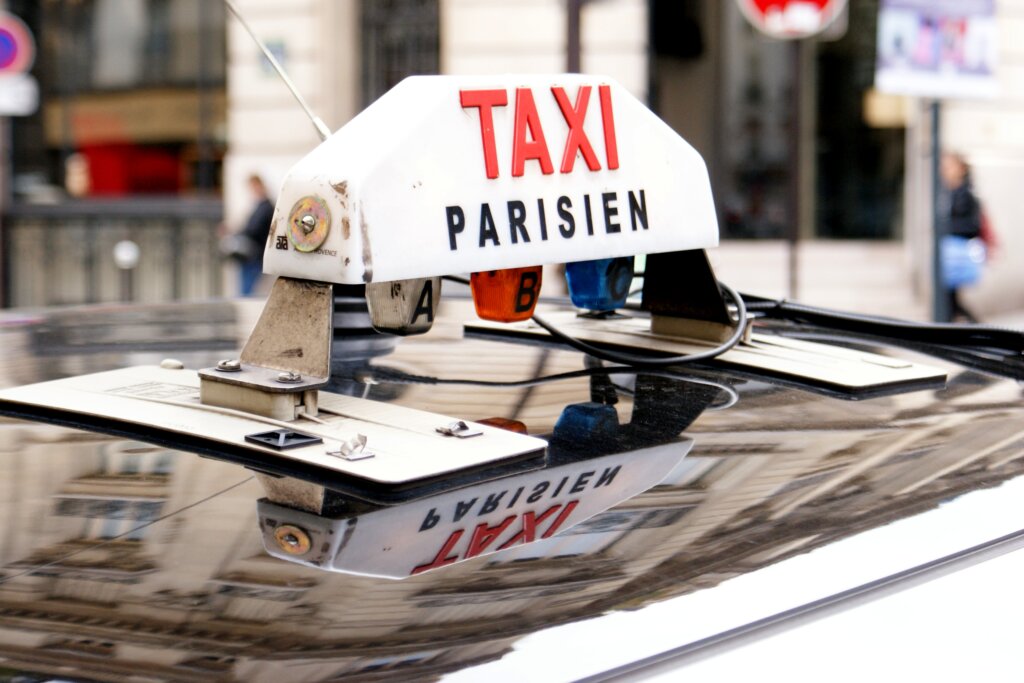 Top of a Parisian taxi with sign