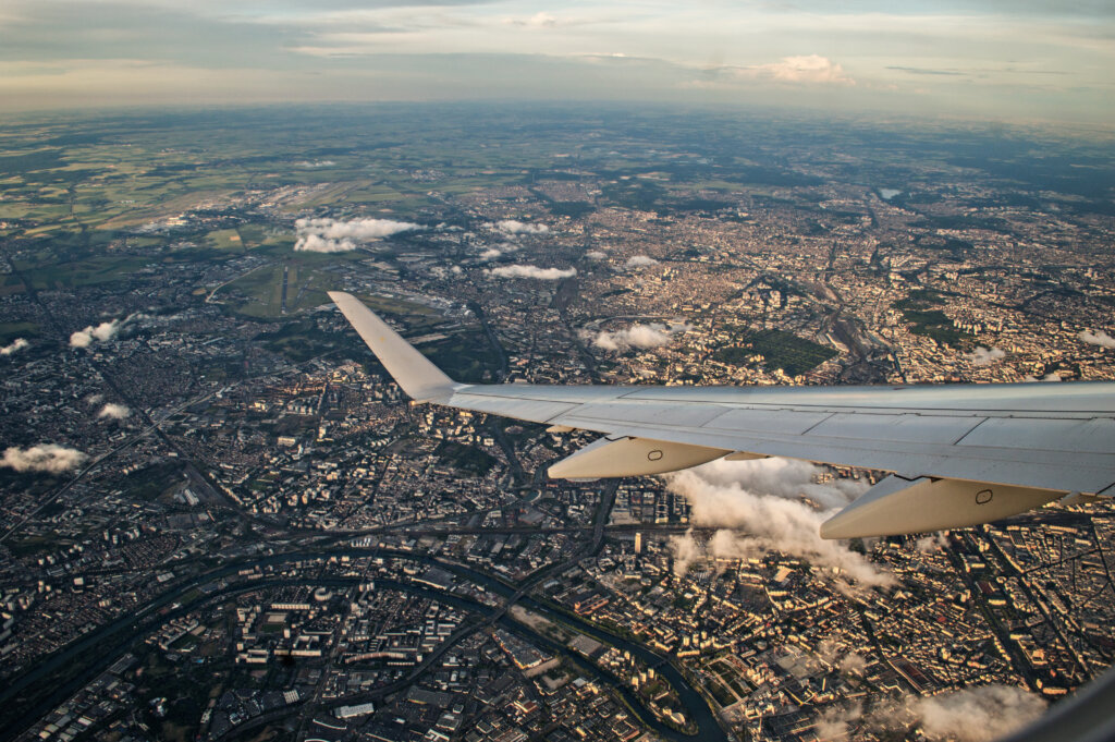 View from the plane window flying over Paris