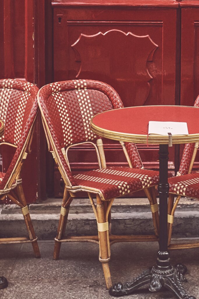 Red chair and table at Parisian cafe