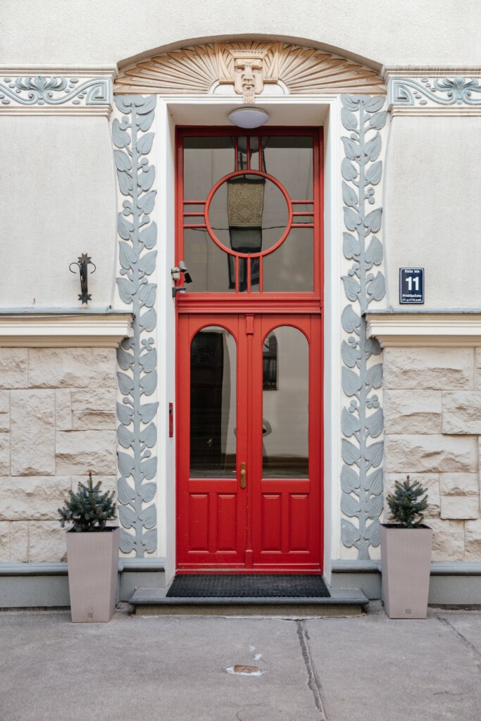 Red door at an art nouveau entranceway in Riga