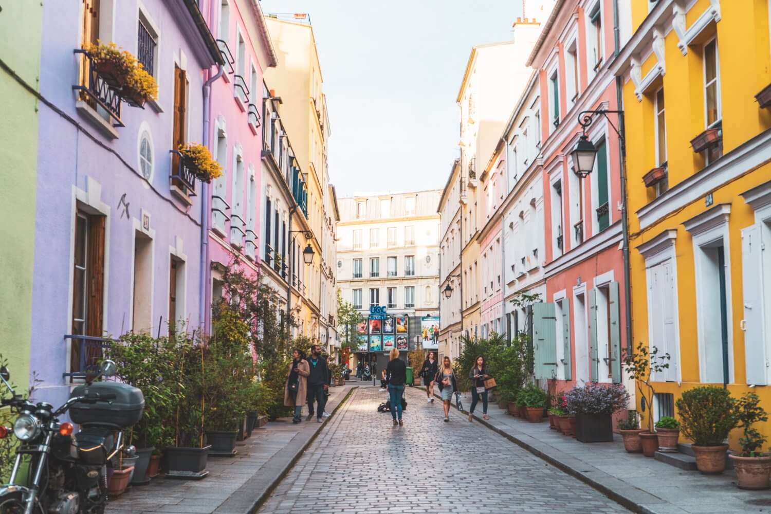 Rainbow road full of pastel houses in Paris, France