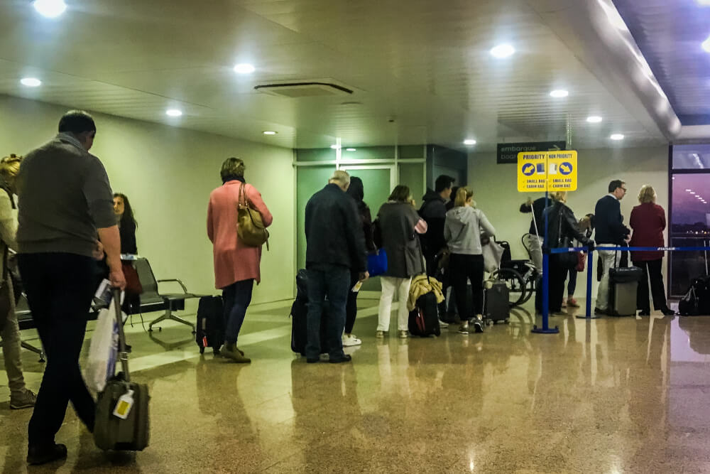 People waiting to board Ryanair flight