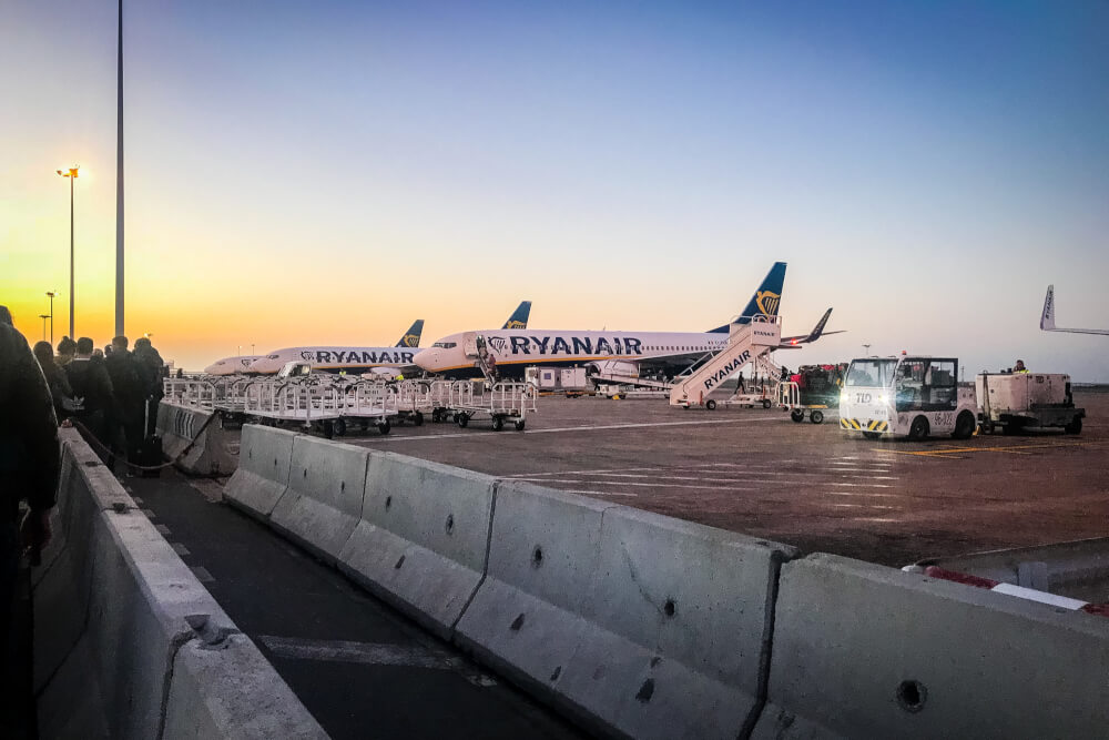 RyanAir planes at airport runway at sunrise