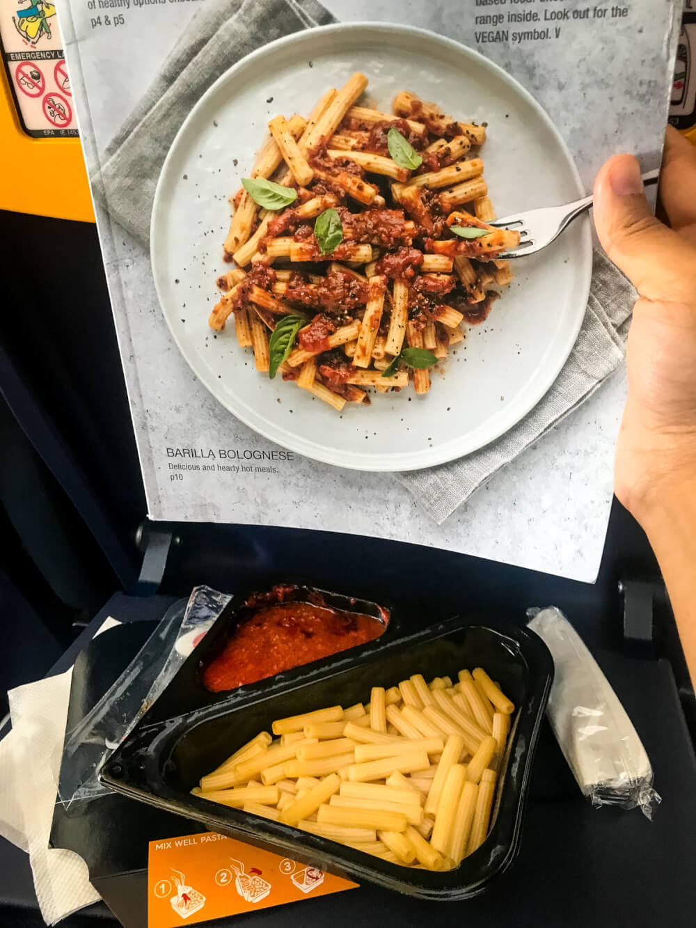 Ryanair in flight pasta compared to the photo from the cover of the menu
