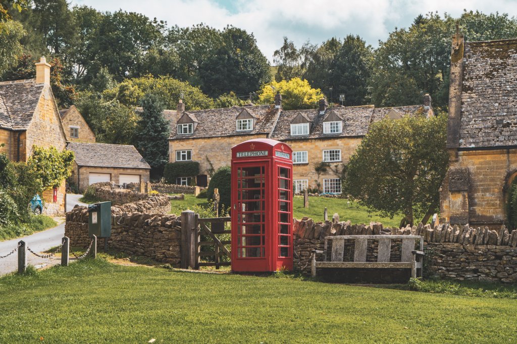 Red phone booth in Snowshill, England.