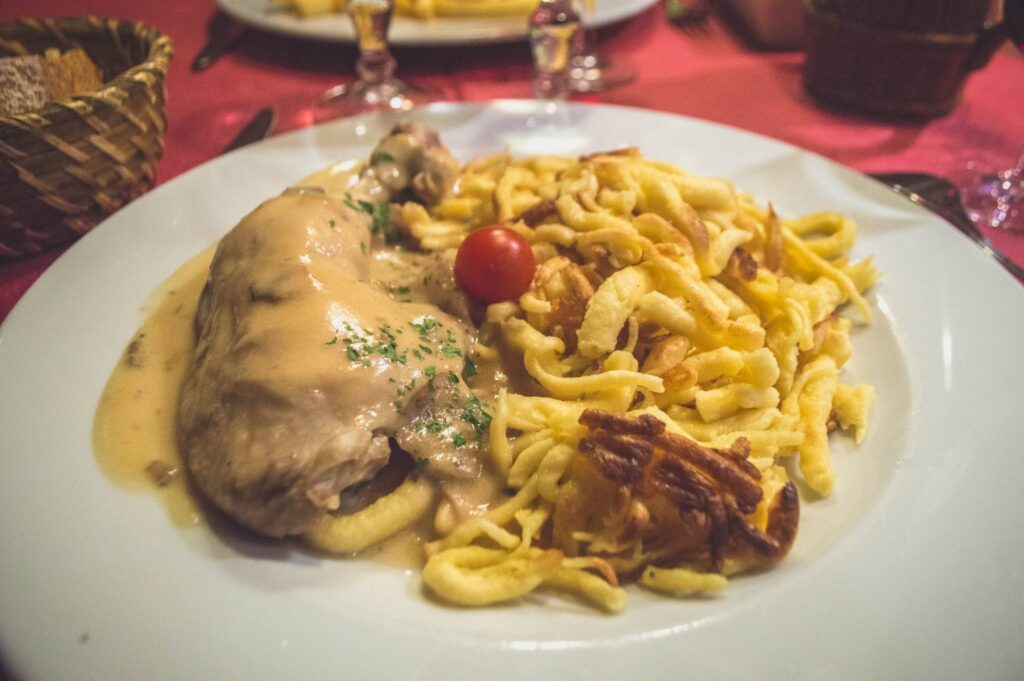 Coq au riesling with spaetzle in a Strasbourg restaurant