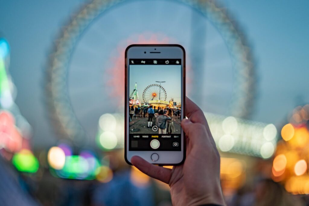 An iPhone taking a photo at Oktoberfest in Munich, Germany,