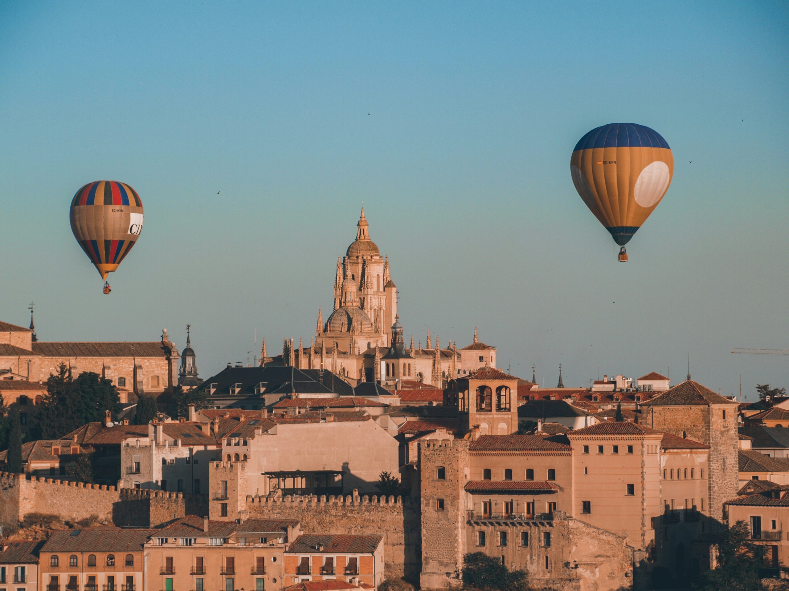 Hot air balloons over a city