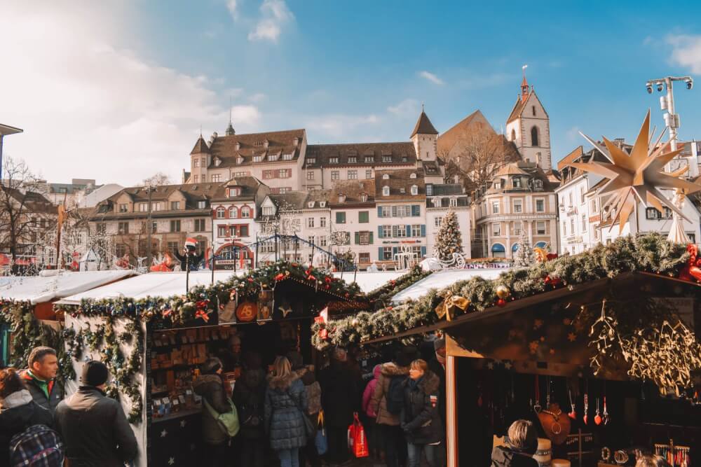 The BEST Christmas markets in Switzerland. If you're looking for a thorough and comprehensive Switzerland Christmas guide, this is it! #ChristmasMarkets #Switzerland #Europe #Christmas