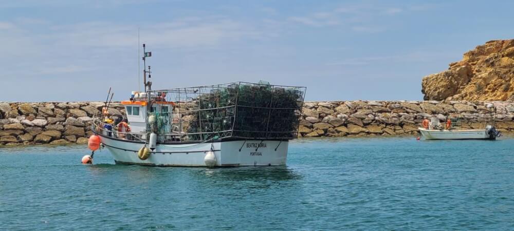 Two boats floating in the Albufeira marina